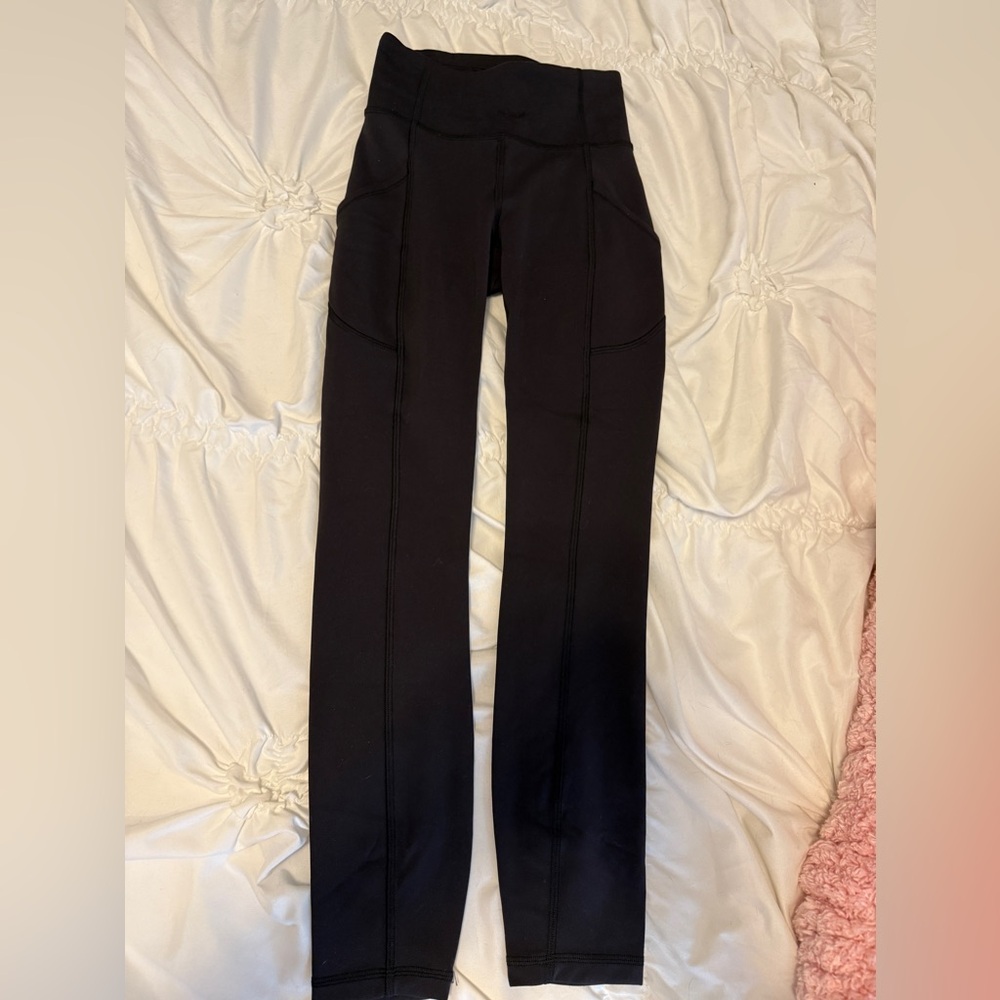 Lululemon black High-Waisted Leggings. Perfect condition, with pockets.